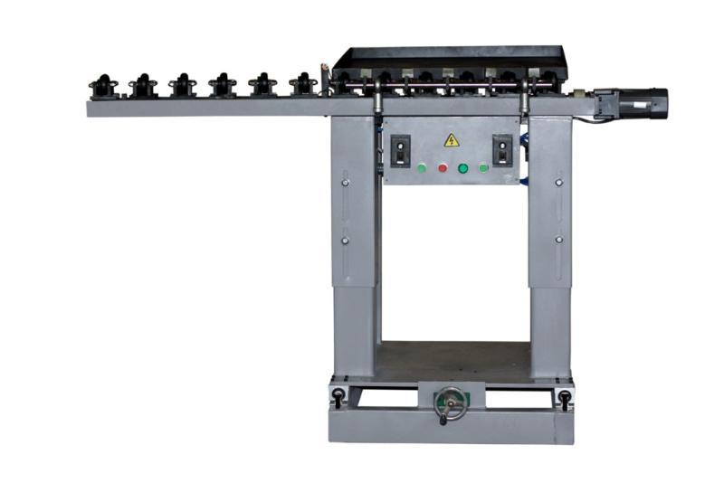 摇臂转床自动卸料装置设计