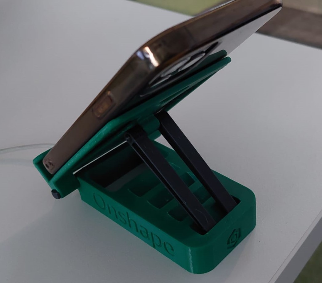 Phone adjustable stand with charger slot