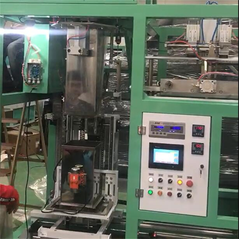 X2708 四工位六面真空包装机 10kg大米包装