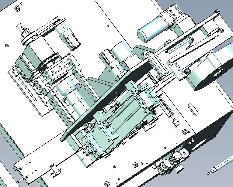 圆轴外圈自动贴胶带装置